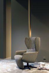 Temptingly cosy.With the new RAPSODY, designer Jean-Pierre Audebert brings a contemporary cocoon version of the classic JORI reclining chair. The latest creation meets all expectations of the current reclining chair fanatic. Delightfully "fluffy" it looks temptingly cosy : as a comfortable shell, ideal for a comfortable rest after a hard day or for a power-nap. The soft pleats of the inner covering, finished in quality leather or fabric, contribute to the wellness factor of this enveloping reclining chair. 